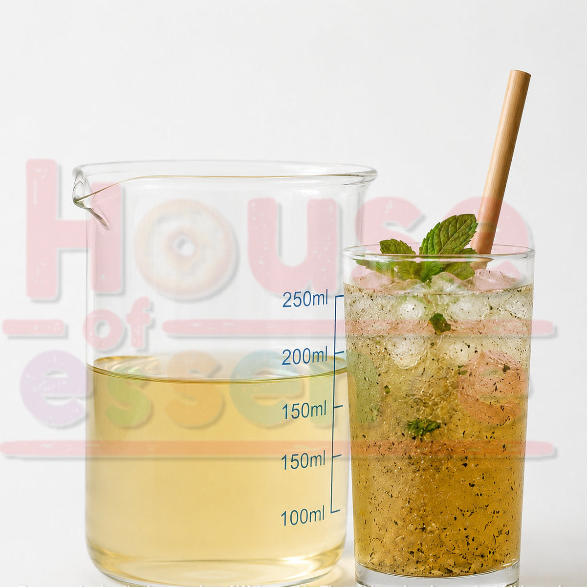 A clear glass measuring beaker filled with pale yellow liquid and a clear glass tumbler filled with a speckled golden drink, ice, mint leaves, and a wooden straw, shown on a white background with a faint watermark.